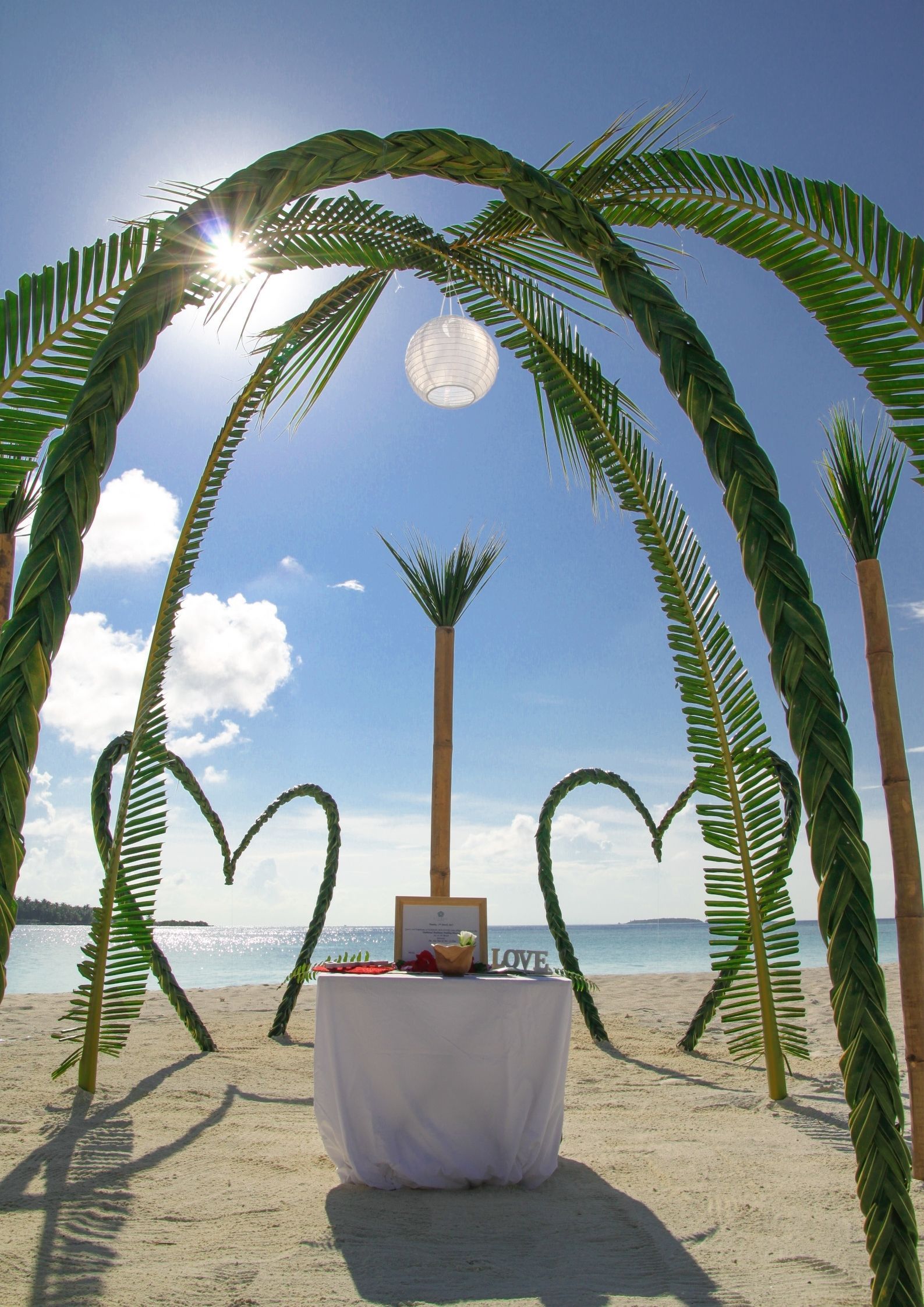 Die Deko mit Palmen am Strand